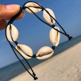 Fit Kolekcja - Bransoletka z muszelkami na rękę black